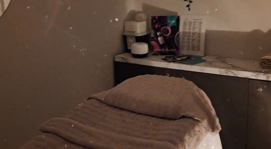 Serene massage room at Jayora Beauty in Colwyn Bay, Wales, GB, featuring a cozy massage bed.