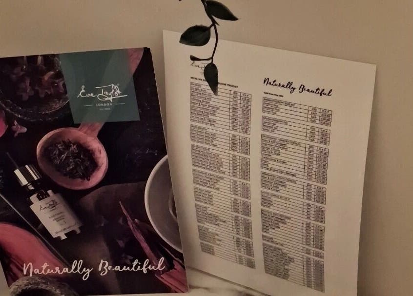 Jayora Beauty service menu in Colwyn Bay, Wales, GB, featuring natural beauty products display.