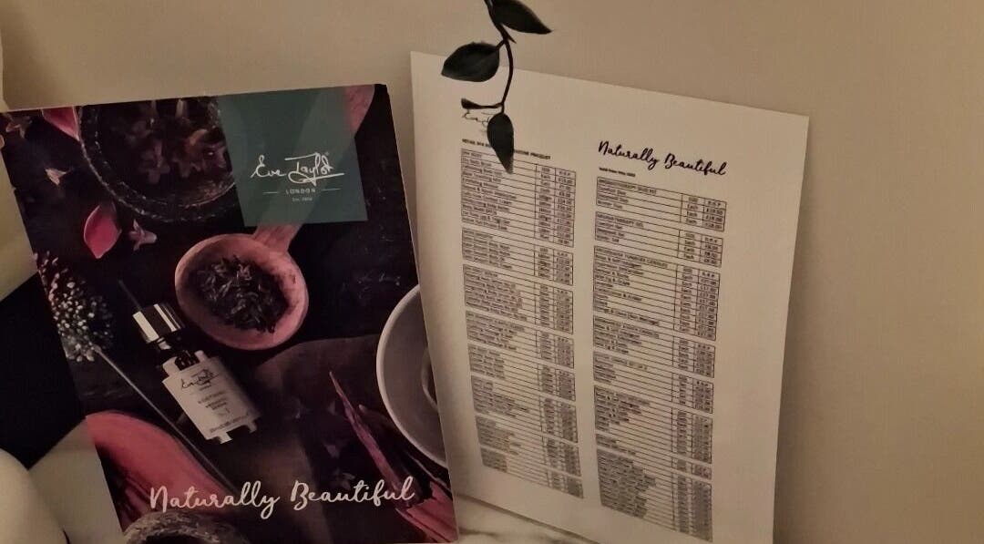 Jayora Beauty service menu in Colwyn Bay, Wales, GB, featuring natural beauty products display.