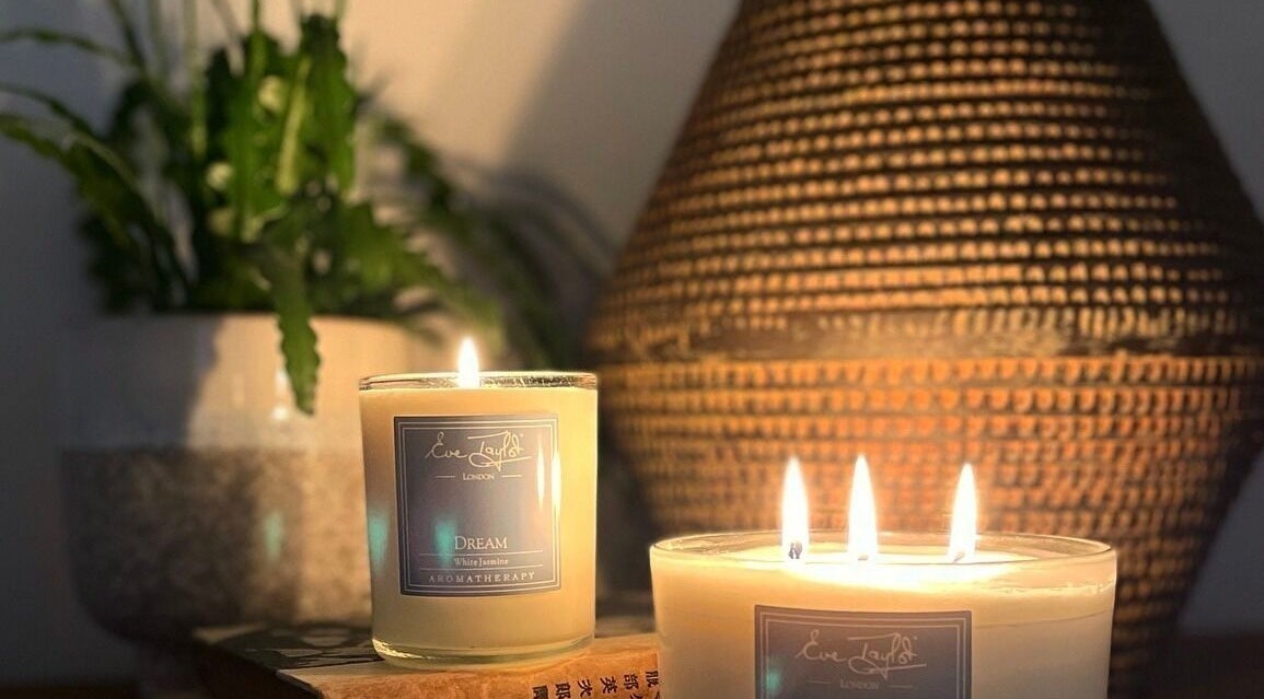 Warm candlelit setting at Jayora Beauty in Colwyn Bay, Wales, GB, enhancing a serene wellness atmosphere.