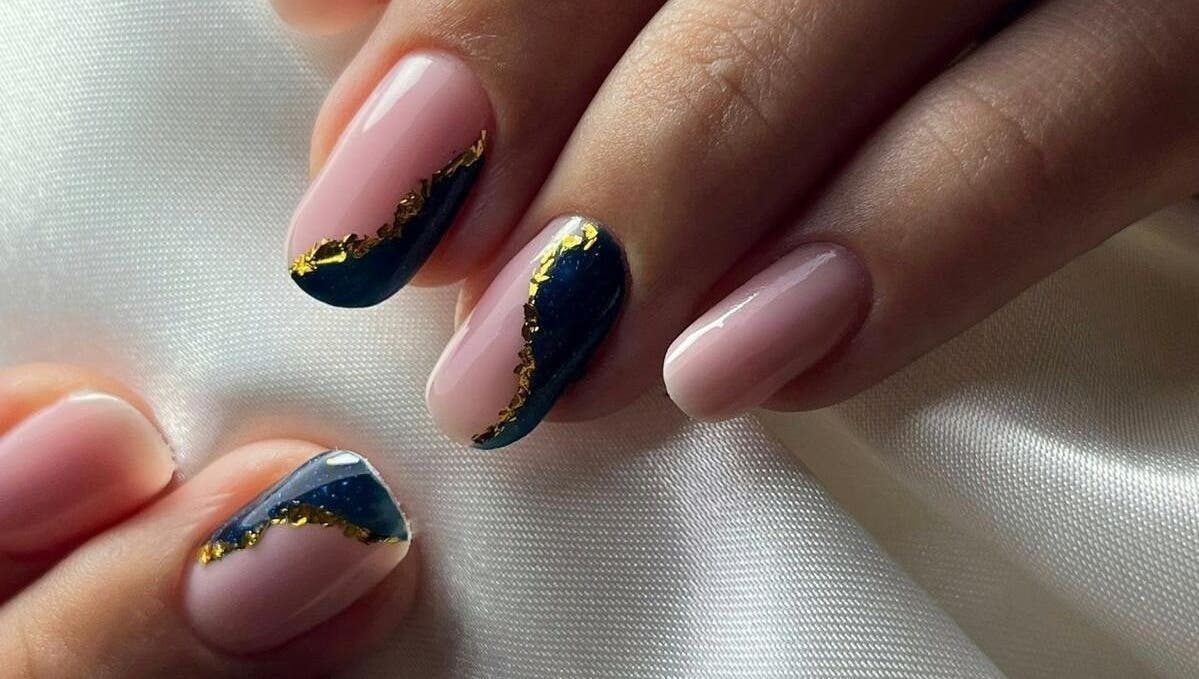 Stylish nail art with navy and gold accents at Deni.xnails, București, București, RO.