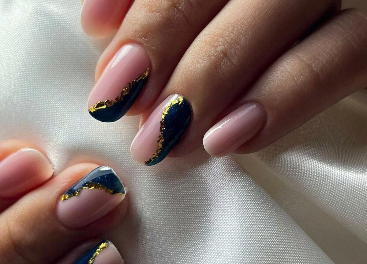 Stylish nail art with navy and gold accents at Deni.xnails, București, București, RO.
