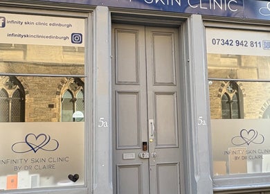 Elegant exterior of Nails by Nita, Edinburgh, Scotland, GB showcasing stylish entryway and branding.