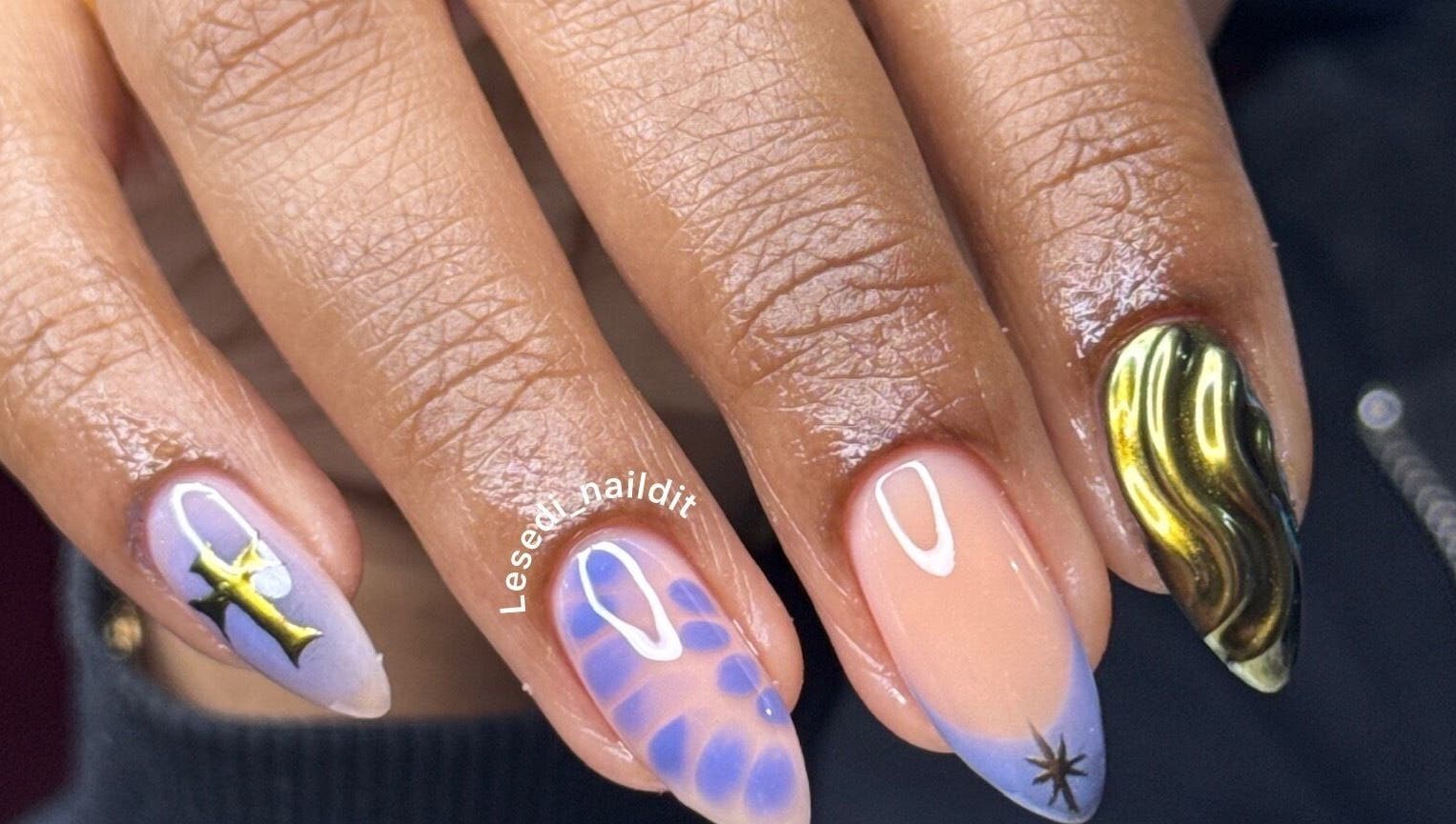 Stylish nail art at Lesedi Naildit, Cape Town, Western Cape, ZA featuring intricate designs and vibrant colors.