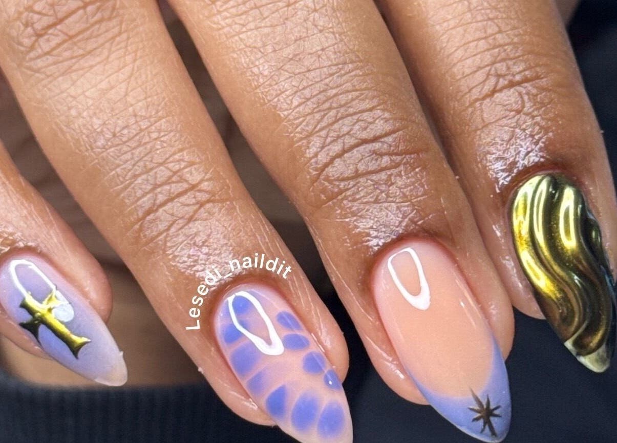 Stylish nail art at Lesedi Naildit, Cape Town, Western Cape, ZA featuring intricate designs and vibrant colors.