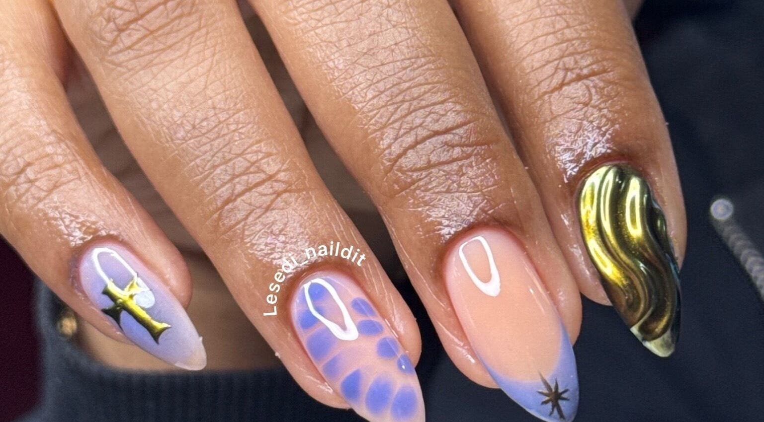Stylish nail art at Lesedi Naildit, Cape Town, Western Cape, ZA featuring intricate designs and vibrant colors.