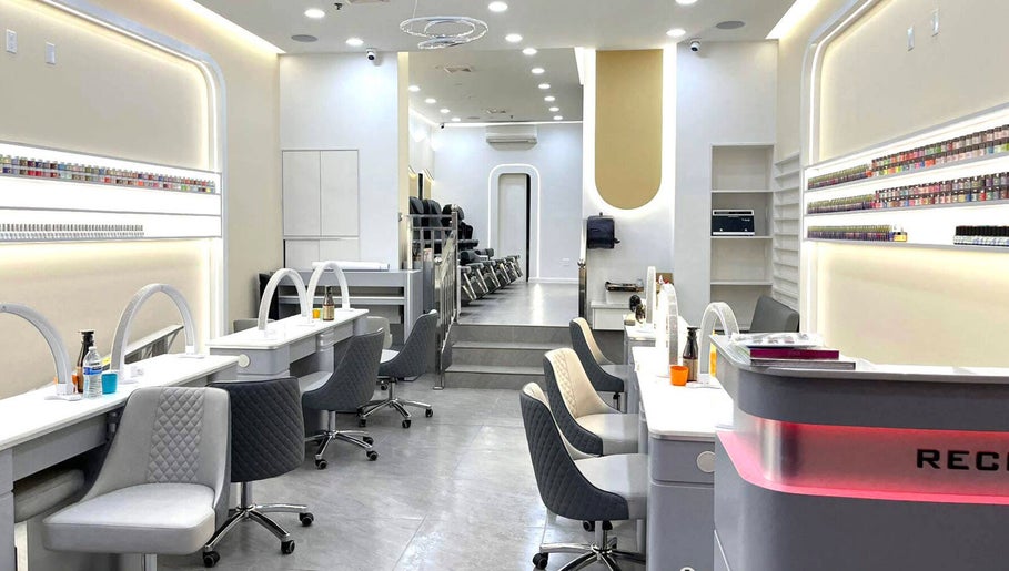 Modern interior of Palette Nails Studio in New York, New York, US, showcasing elegant nail stations and polish display.