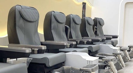 Luxurious pedicure chairs at Palette Nails Studio, New York, New York, US, offering comfort and style.