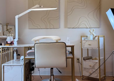 Luxurious nail station at Eva Nails, Sonora, California, US, featuring chic decor and modern equipment.