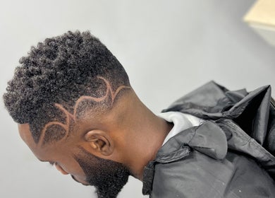 Stylish haircut with detailed design at Empire Fades Tonsorium, Arima, Arima Borough Corporation, TT.
