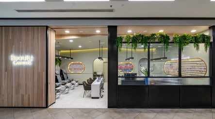 Modern nail salon interior at Beauty Genesis - Brunswick, Melbourne, Victoria, AU, featuring sleek design and greenery.