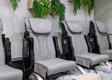 Luxury pedicure chairs at Beauty Genesis - Brunswick, Melbourne, Victoria, AU with lush greenery.