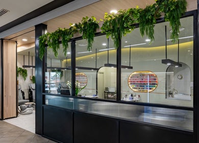 Beauty Genesis - Brunswick exterior with lush plants, located in Melbourne, Victoria, AU.