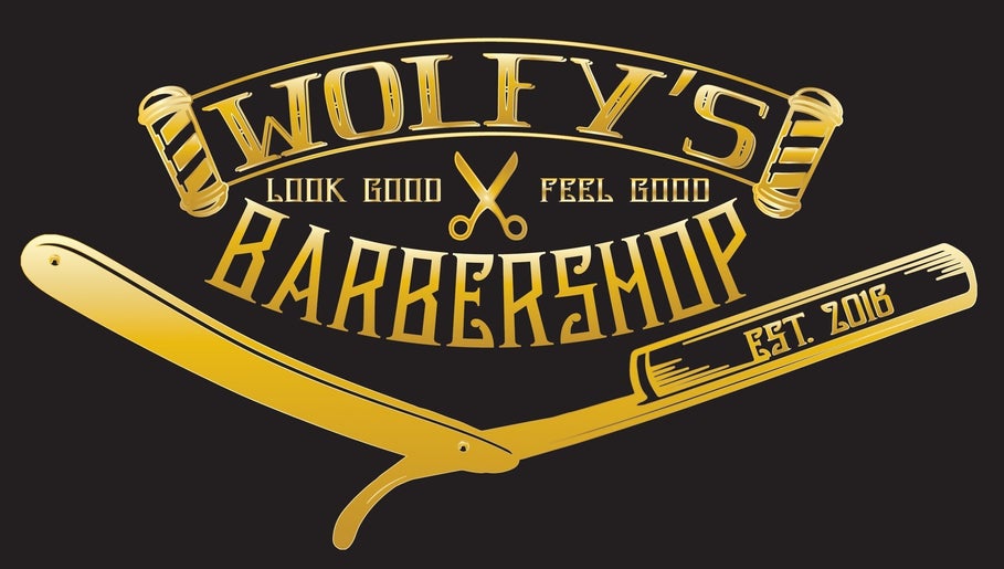 Gold razor logo of Wolfy’s Barbershop in Sedalia, Missouri, US, featuring scissors and barber pole.