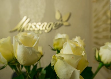 Elegant white roses at Massage In LA, Los Angeles, California, US. Perfect for relaxation ambiance.