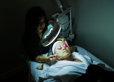 Client receiving a facial treatment at Massage In LA, located in Los Angeles, California, US.