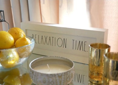 Relaxation setup at Massage In LA with lemons and candles in Los Angeles, California, US.