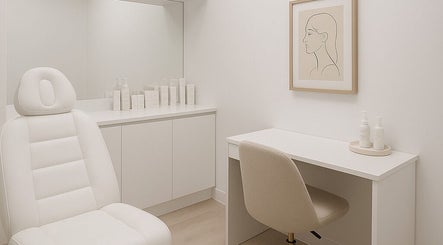 Modern treatment room at Bloom Integral Wellness in Melbourne, Victoria, AU with sleek white decor.