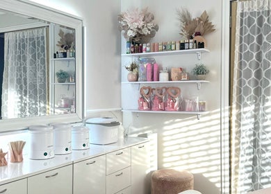 Elegant beauty room at Luxxe Beauty Cosmetics in Eaton, Western Australia, AU, featuring chic decor and shelving.