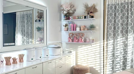 Elegant beauty room at Luxxe Beauty Cosmetics in Eaton, Western Australia, AU, featuring chic decor and shelving.