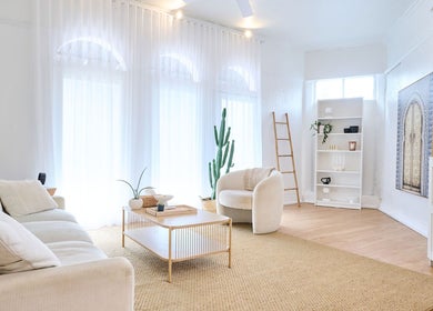 Calming therapy room at Sydney Wide Counselling, Stanmore, New South Wales, AU with neutral decor and soft lighting.