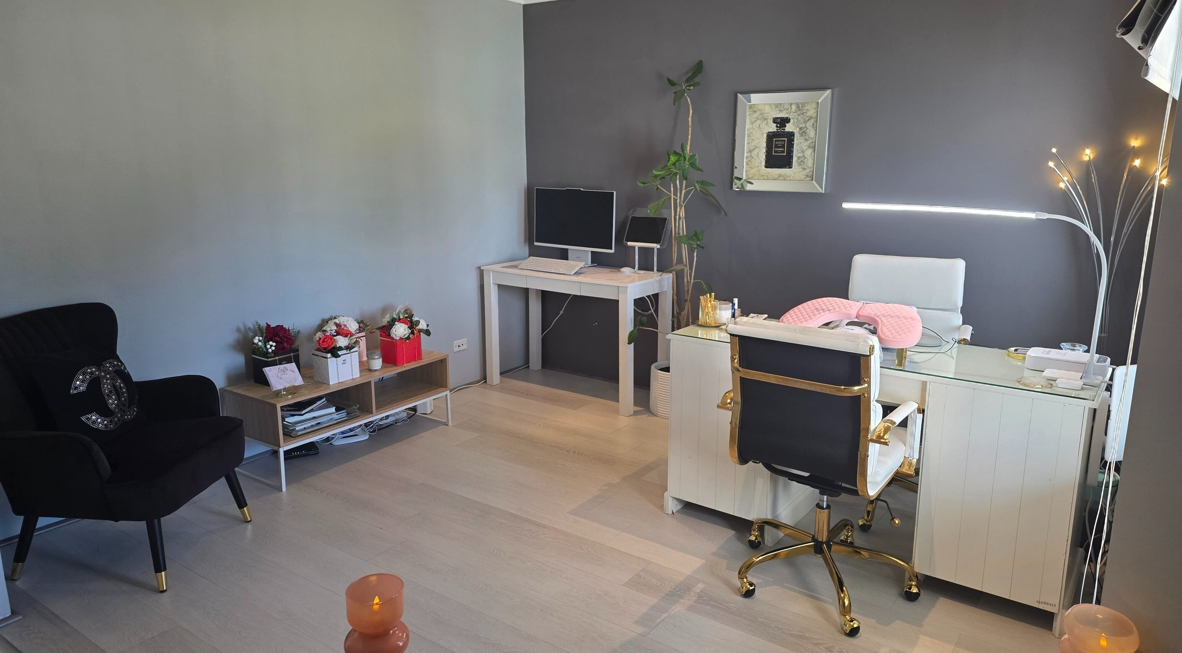 Modern nail studio at The Nail Edit, Butler, Western Australia, AU featuring elegant decor and comfortable seating.