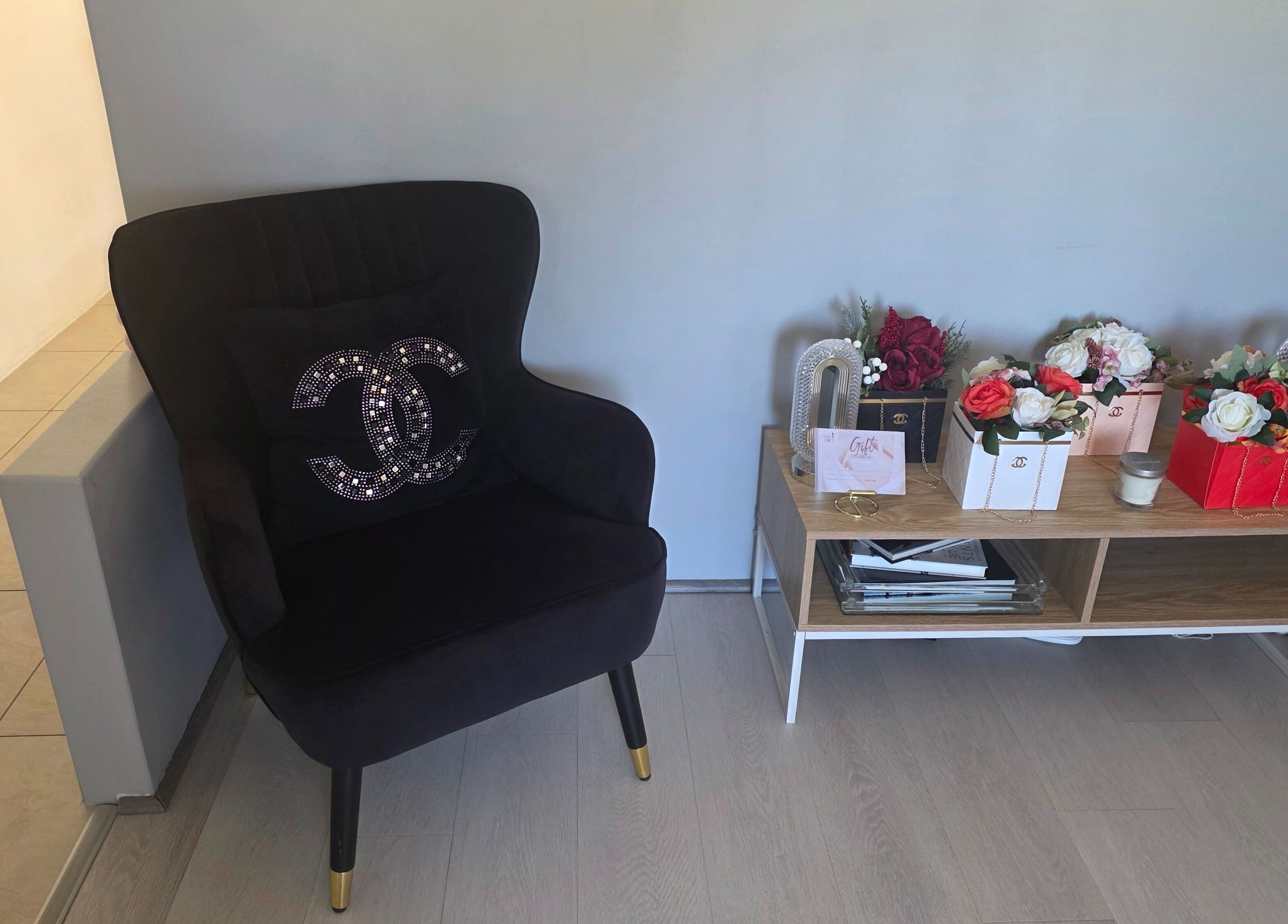 Elegant seating area with flowers at The Nail Edit, Butler, Western Australia, AU.