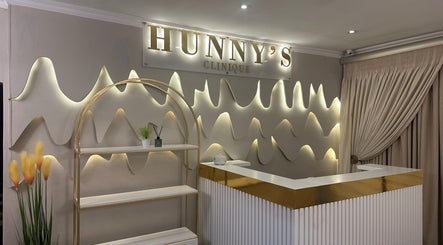 Stylish reception area at Hunny's Clinique PTA, Pretoria, Gauteng, ZA with wave-themed wall decor.