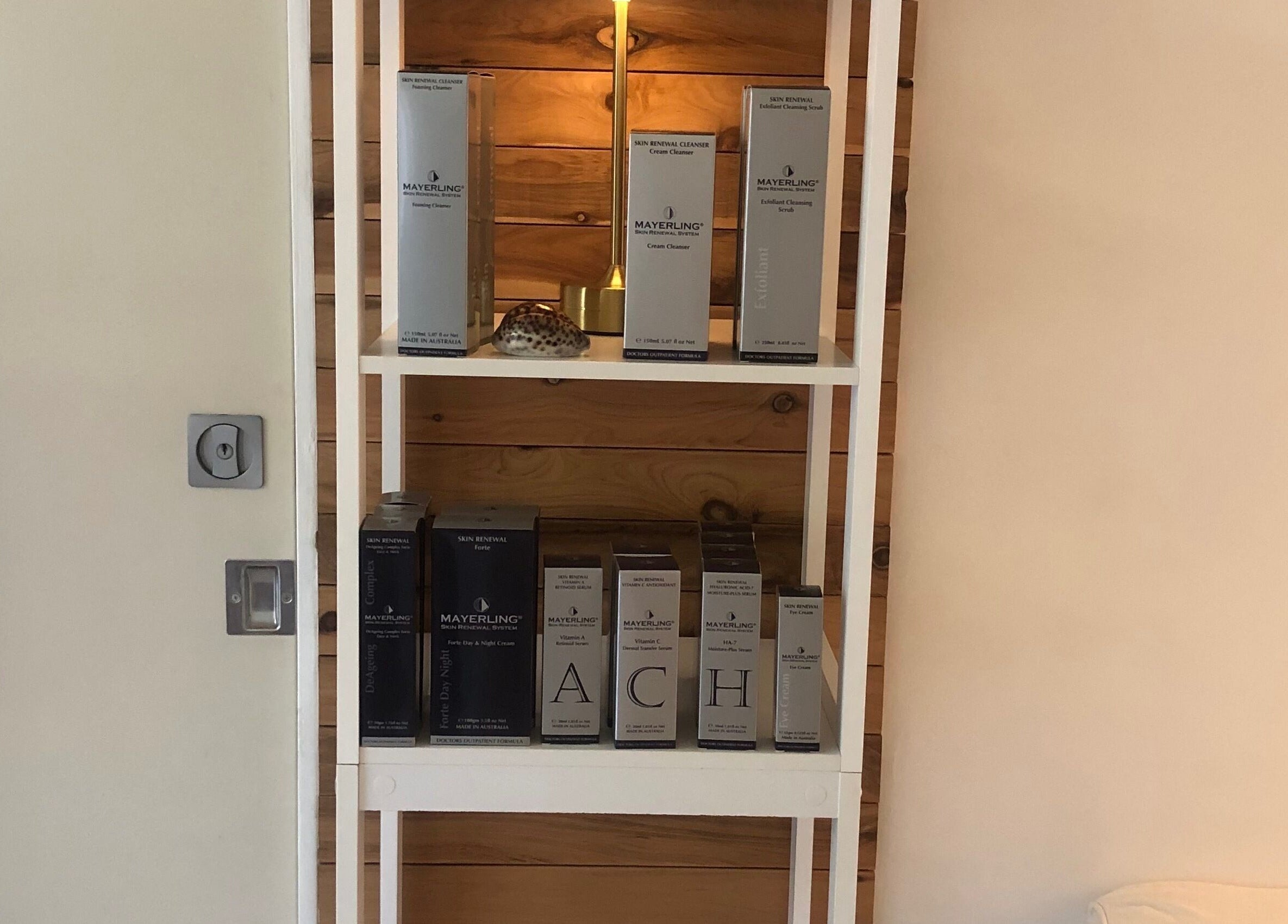 Skincare products neatly displayed at Beauty 2464, Yamba, New South Wales, AU, enhancing wellness ambiance.