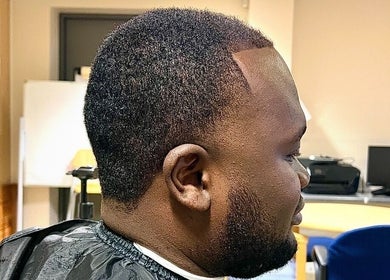 Close-up of a stylish haircut at London Made Paris, London, England, GB showcasing modern grooming.