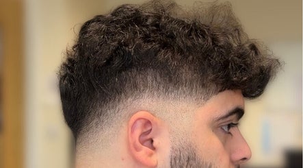 Side view of a trendy men's fade haircut at London Made Paris, London, England, GB.