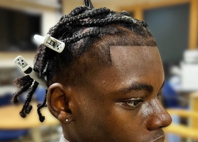 Close-up of braided hairstyle at London Made Paris, London, England, GB.