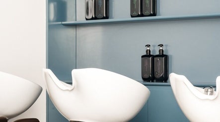 Contemporary wash stations at HAIR EDIT by Chloe in Melbourne, Victoria, AU. Modern and inviting salon setup.