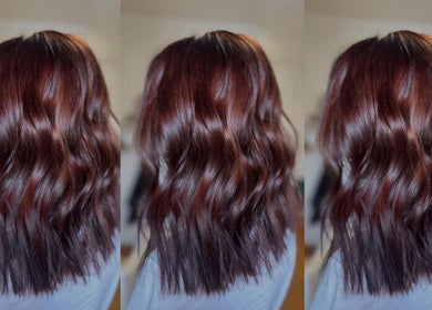 Beautiful wavy brunette hairstyle at Je T'aime, Novi Sad, Vojvodina, RS salon, showcasing elegant shine.