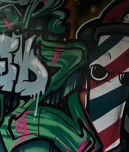 Colorful mural with barber pole design at s.r blendz, Kerikeri, Northland Region, NZ.