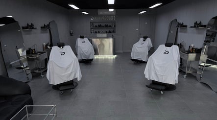 Modern Dz Barbershop interior with sleek chairs, Melbourne, Victoria, AU.