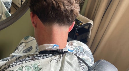 Close-up of a fresh haircut at Kris his house, Den Haag, Zuid-holland, NL, showcasing skillful styling.