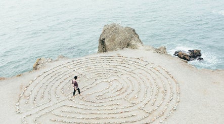 Labyrinth by the sea at Reframe and Rise, Cambridge, England, GB, offering tranquil wellness experience.