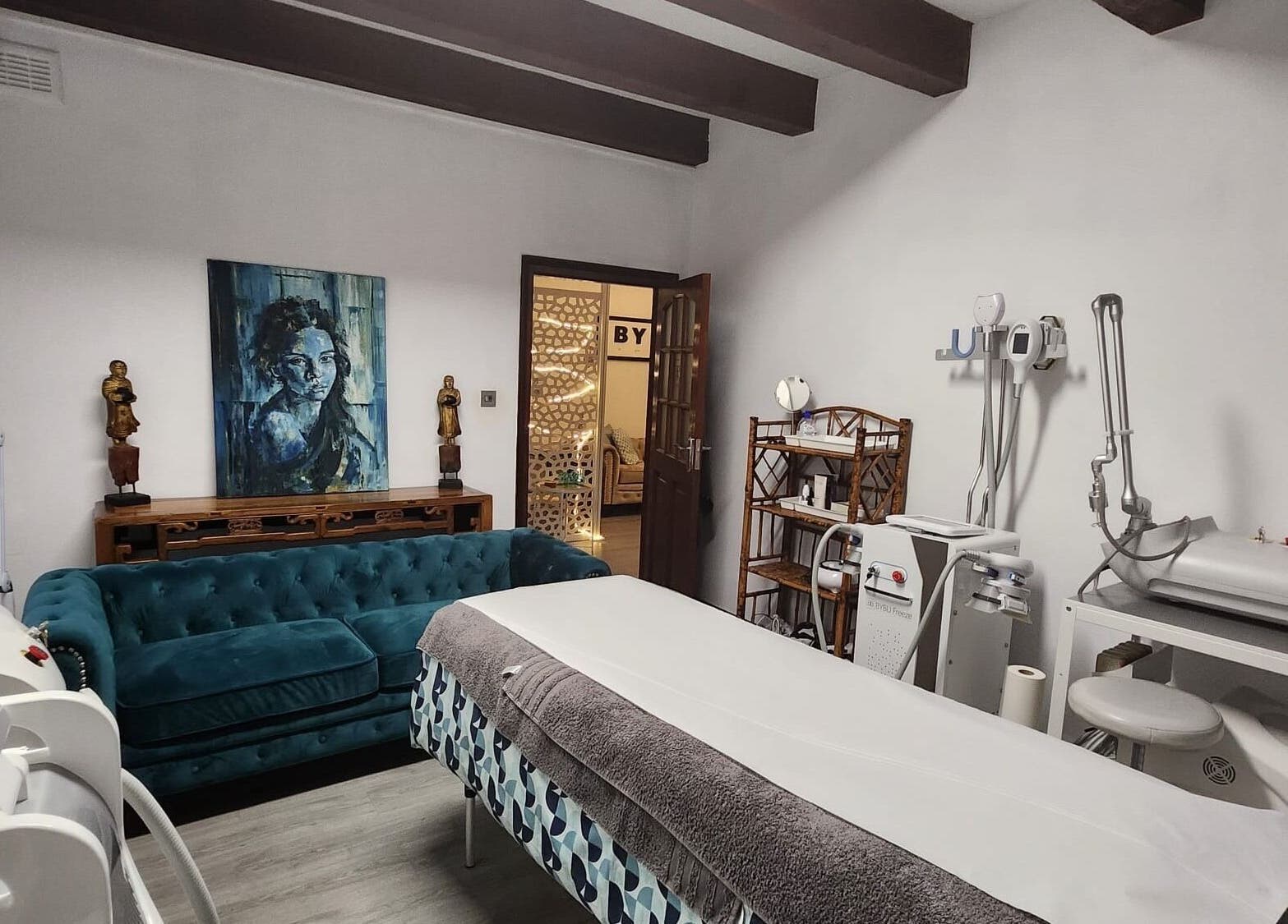 Spa treatment room at Bybu Aesthetics and Wellness, Gibraltar, GI, featuring modern equipment and soothing decor.
