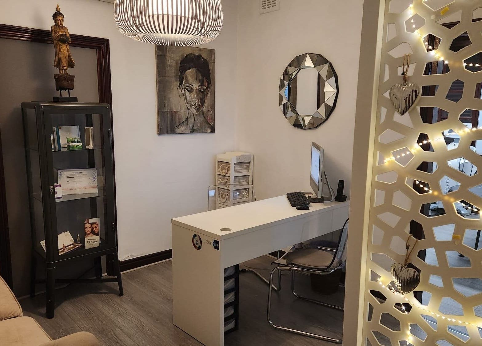 Welcoming reception at Bybu Aesthetics and Wellness, Gibraltar, GI, featuring elegant decor and artwork.