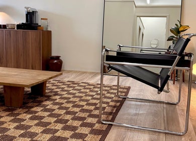 Stylish lounge with modern furniture at strp., Edinburgh, Scotland, GB, featuring a sleek chair and decor.