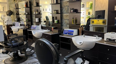 Modern barber chairs and styling stations at 700 Gents Salon - Voco, Dubai, Dubai, AE.