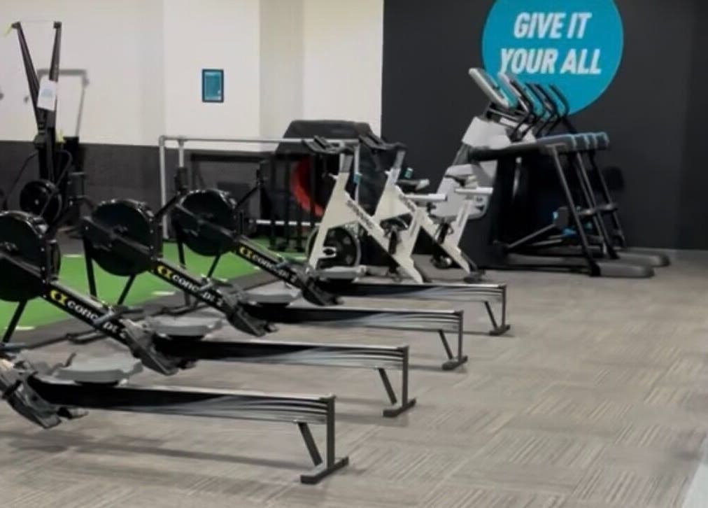 Modern gym equipment setup at Fit With Pheebs, Weston-super-mare, England, GB. Includes rowing machines and treadmills.