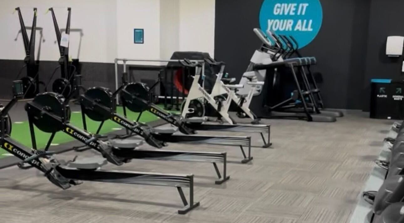 Modern gym equipment setup at Fit With Pheebs, Weston-super-mare, England, GB. Includes rowing machines and treadmills.