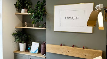 Stylish interior at Browlines By Em, Welwyn Garden City, England, GB featuring elegant decor and plants.