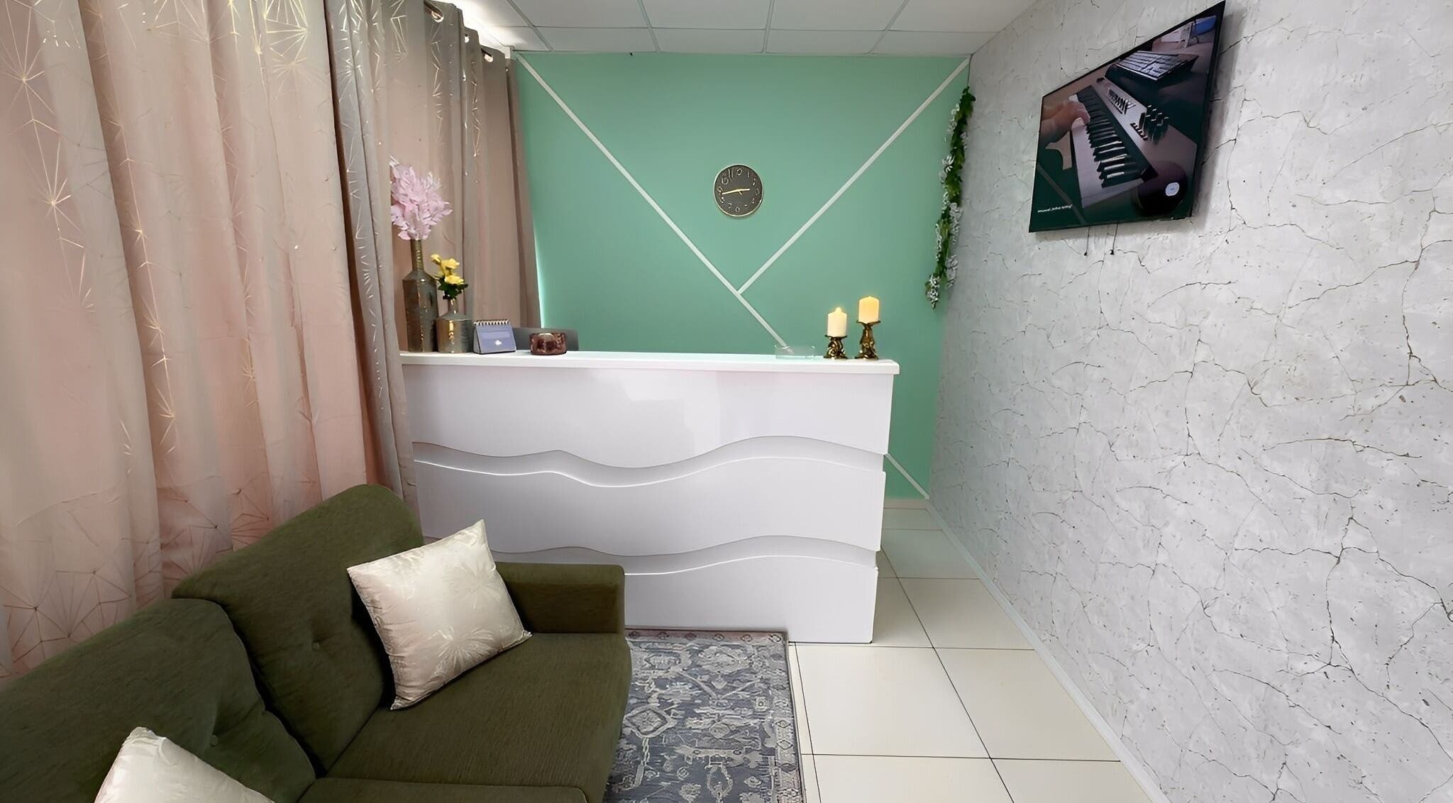 Elegant reception area at Glorious Touch Day Spa, Oranjestad, AW with chic decor and serene ambiance.