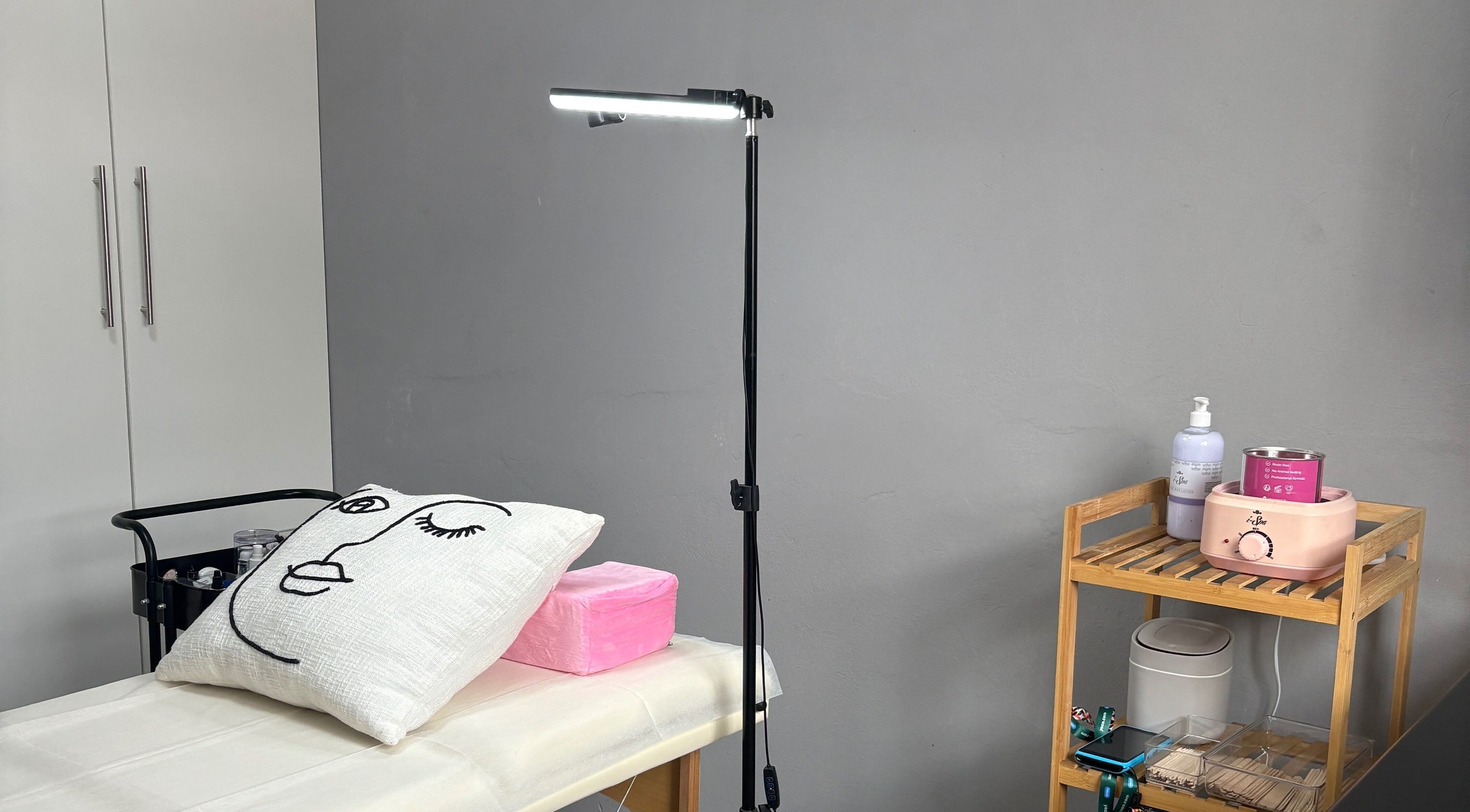 Beautified By Kay treatment room featuring cozy bed and modern equipment in Alberton, Gauteng, ZA.