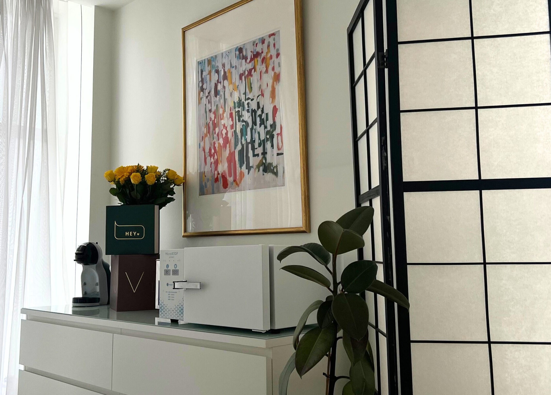 Elegant decor at The Nail Muse by Tasha, Carlisle, England, GB showcasing art, plants, and a serene setting.