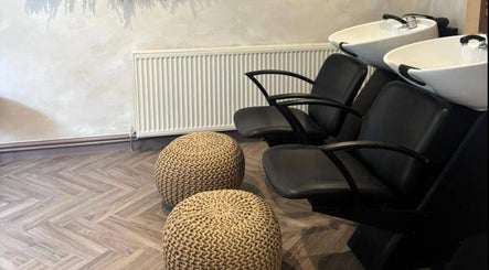 Comfortable wash station at Hair By B, Amica Hair & Beauty, Thirsk, England, GB showcasing modern design.