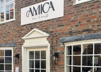 Exterior view of Hair By B at Amica Hair & Beauty, Thirsk, England, GB, showcasing its welcoming entrance.